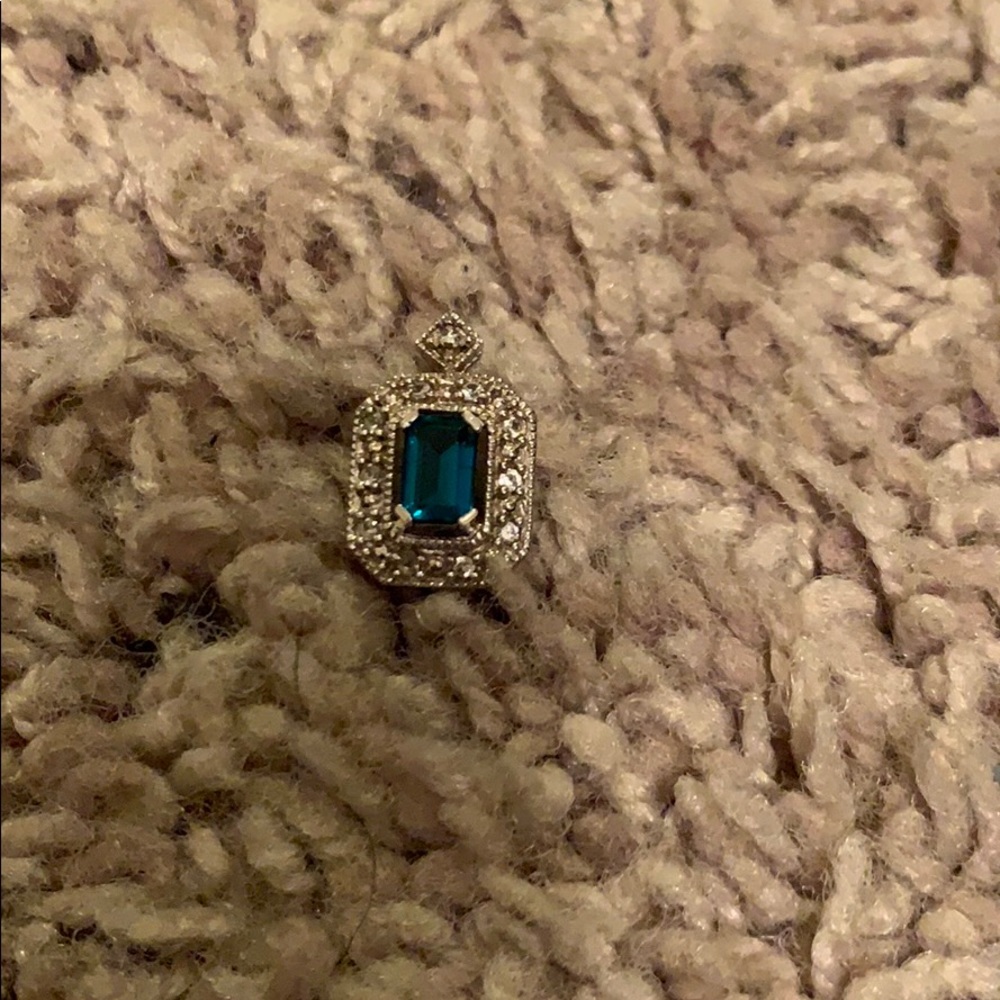 Simulated emerald pendant with diamond chips